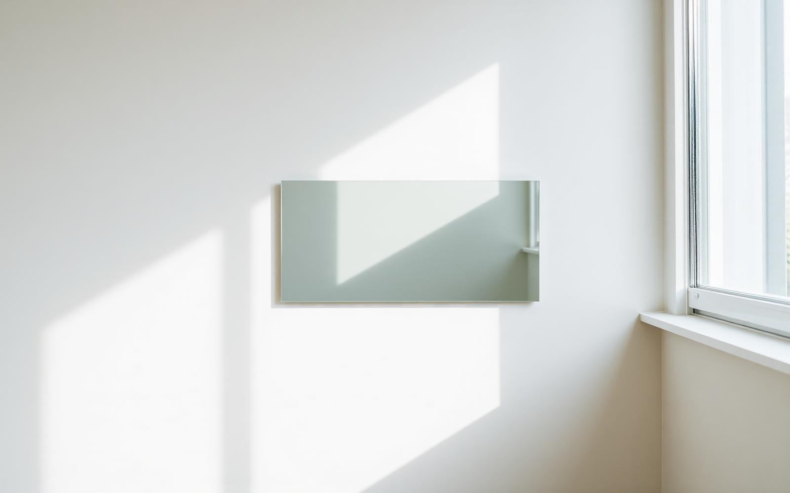 Soft daylight falling across a calm neutral surface